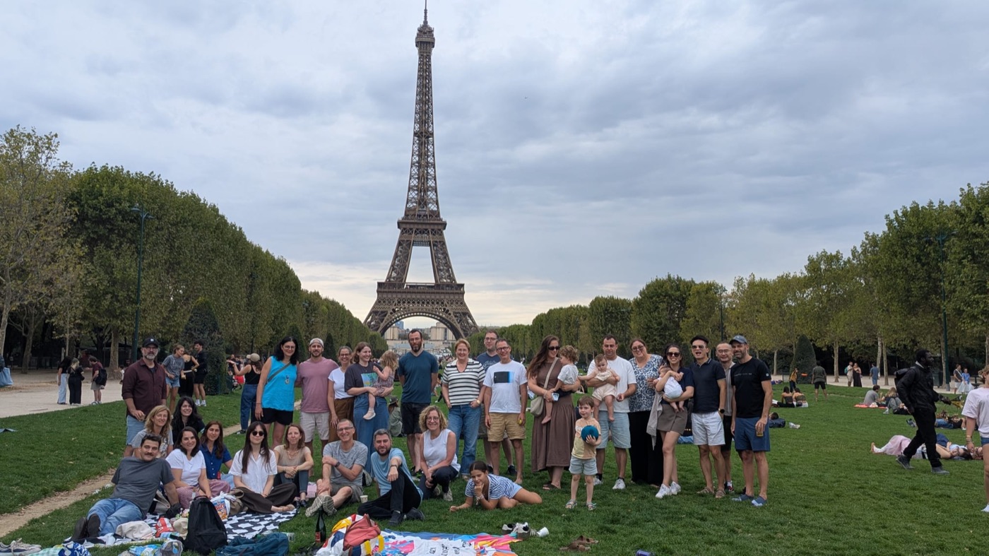 Community picnic at Champ de Mars with the Eiffel Tower behind